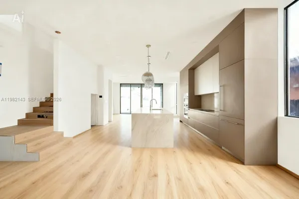 a spacious bathroom with a tub and shower