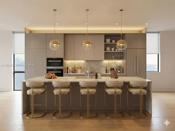 a kitchen with stainless steel appliances kitchen island granite countertop a table and chairs