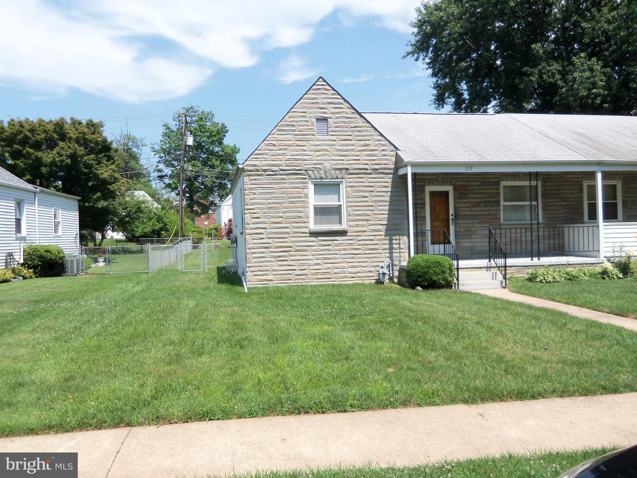 519 St Patrick Road Baltimore, MD 21206 - Photo 3 of 19 a view of a house with a backyard