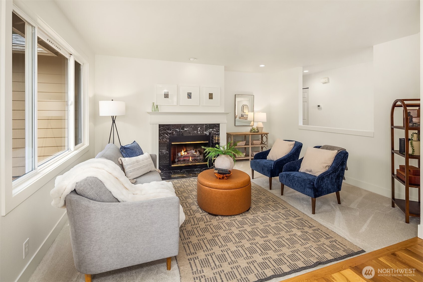 4549 329th Place Southeast Fall City, WA 98024 - Photo 14 of 35 a living room with furniture and a fireplace