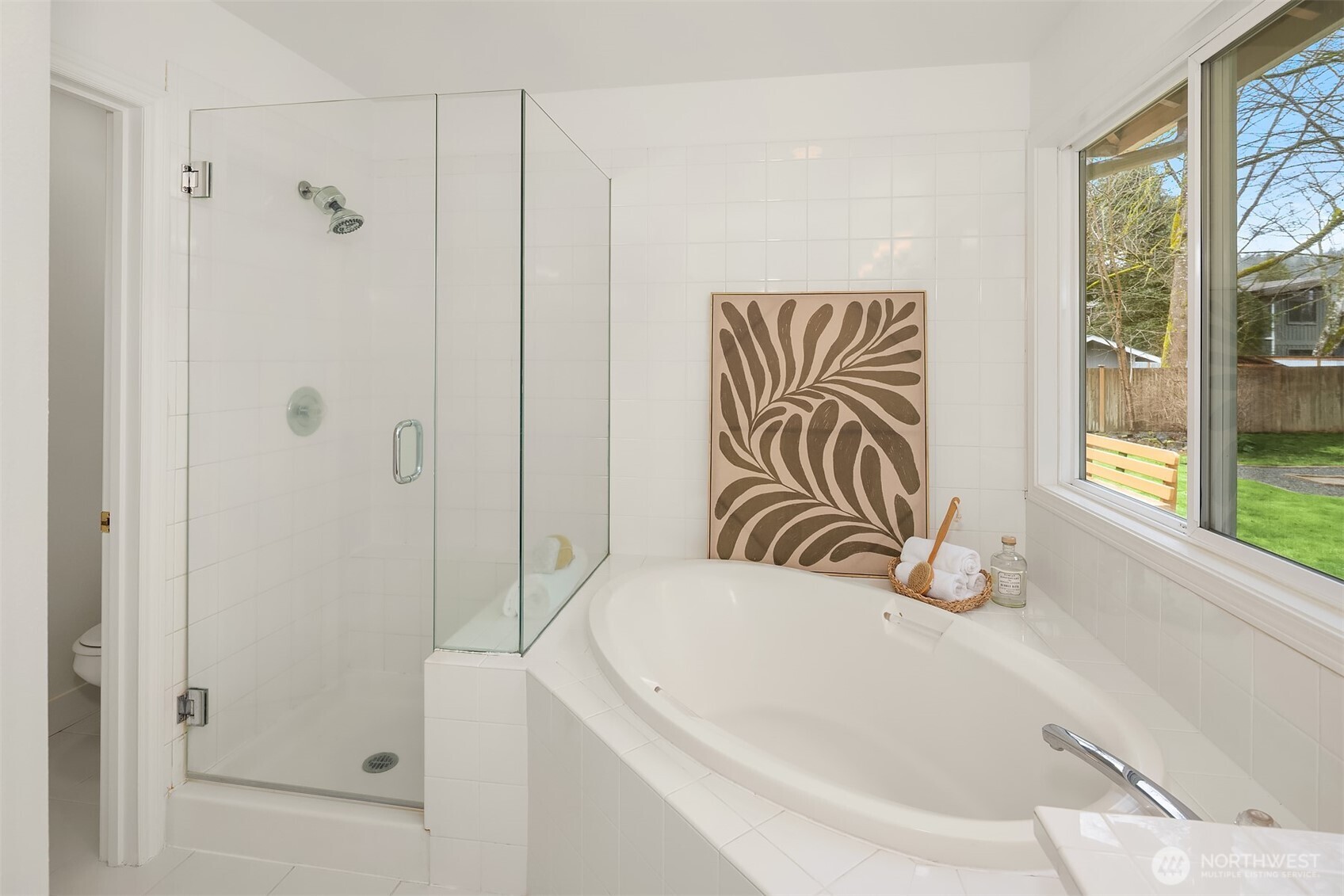 4549 329th Place Southeast Fall City, WA 98024 - Photo 20 of 35 a bathroom with a bathtub and a shower