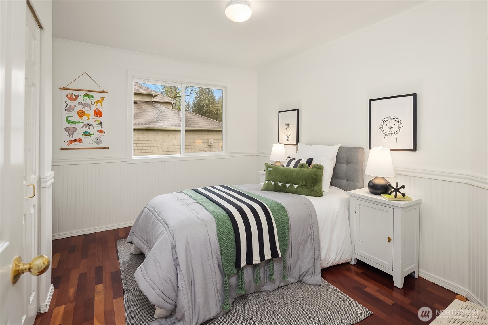 4549 329th Place Southeast Fall City, WA 98024 - Photo 21 of 35 a bedroom with a bed and wooden floor