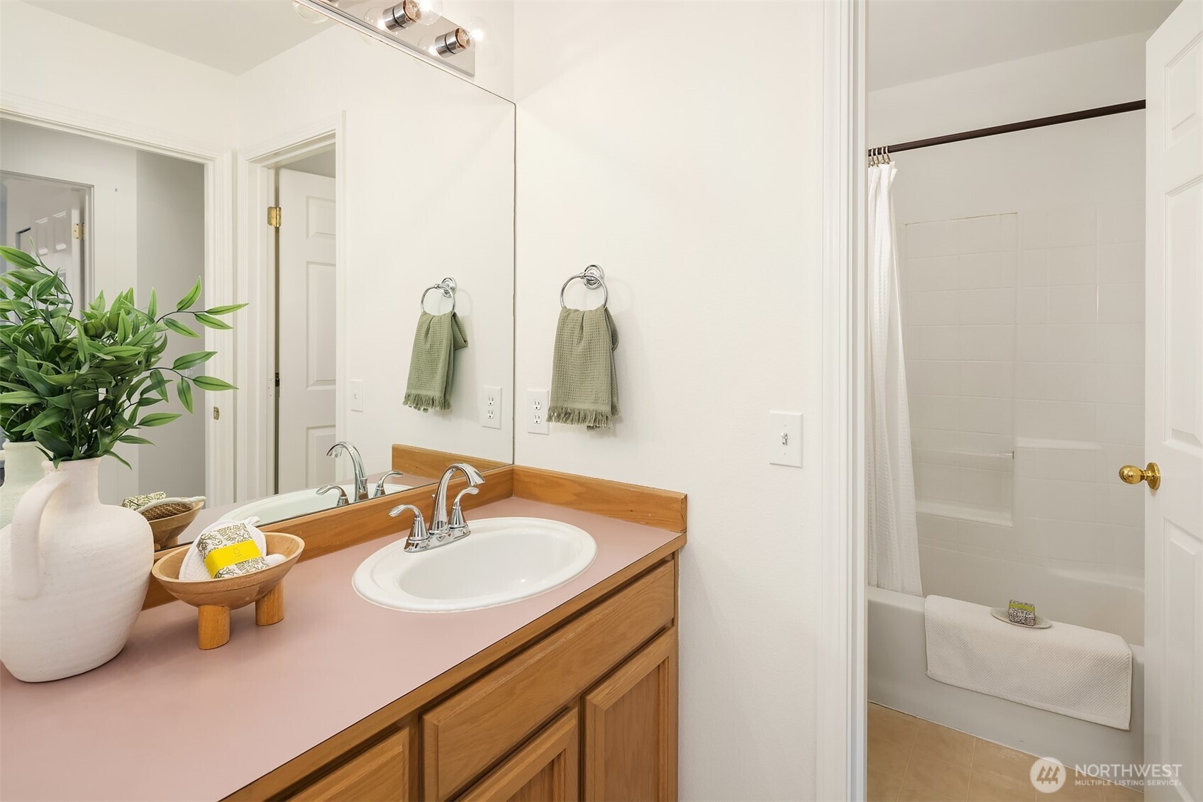 4549 329th Place Southeast Fall City, WA 98024 - Photo 23 of 35 a bathroom with a granite countertop sink and a mirror