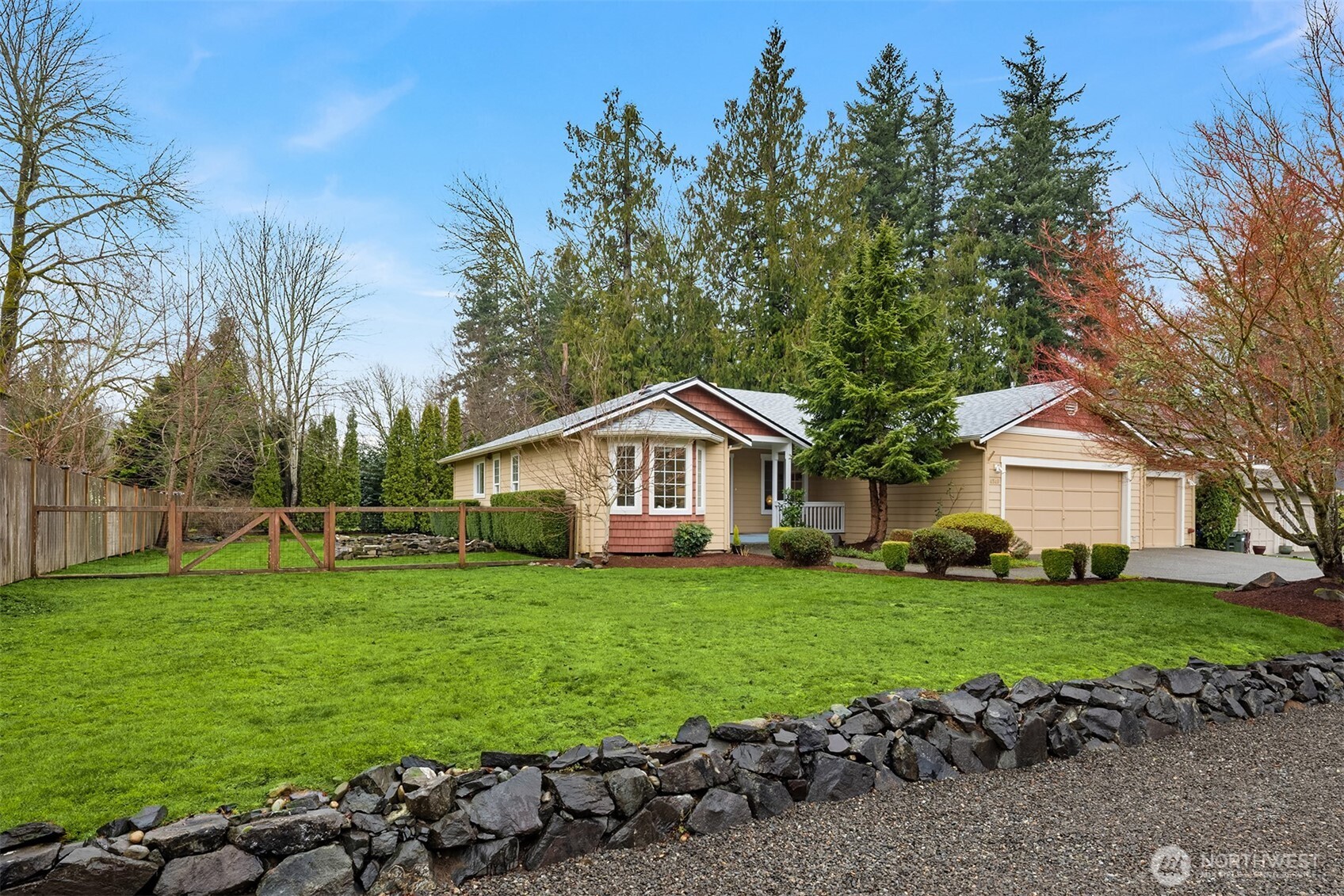 4549 329th Place Southeast Fall City, WA 98024 - Photo 26 of 35 a front view of a house with a yard and trees