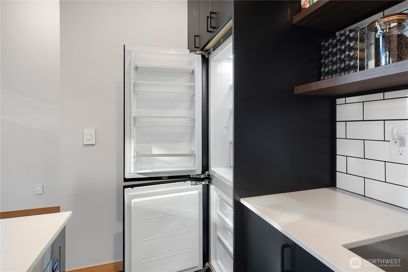 2475 15th Street Port Townsend, WA 98368 - Photo 12 of 27 a kitchen with a refrigerator and a sink