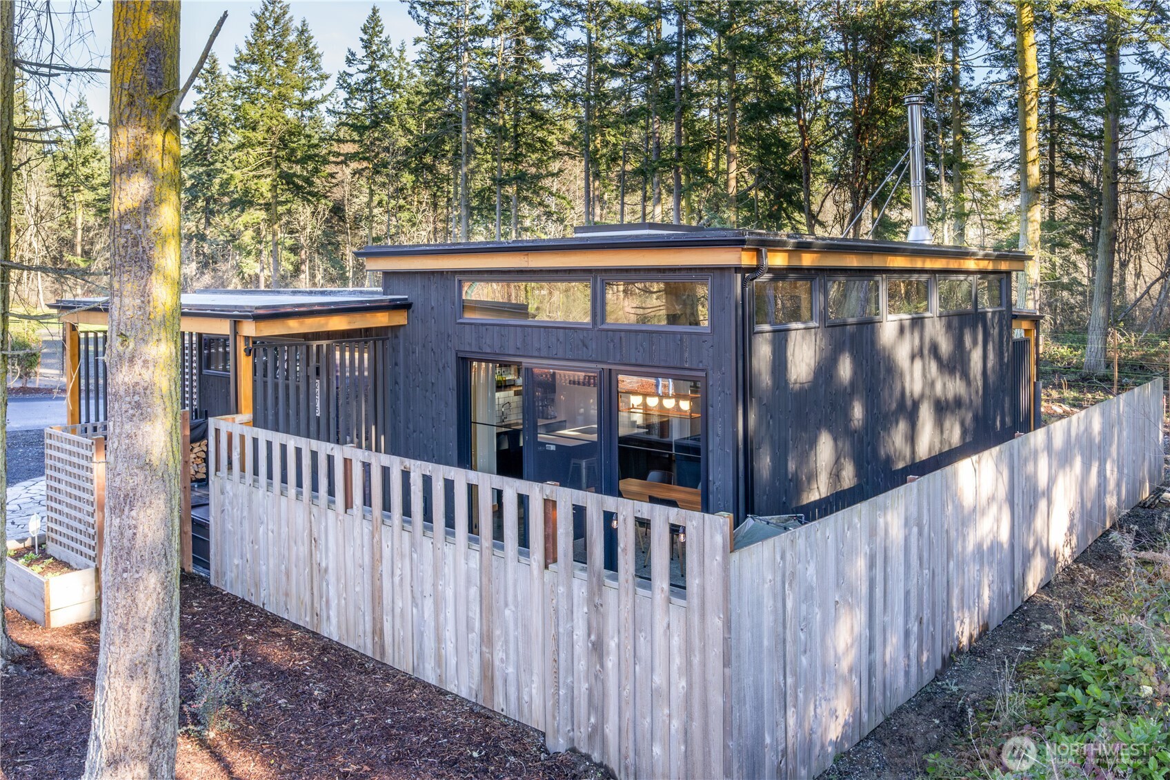 2475 15th Street Port Townsend, WA 98368 - Photo 2 of 27 a view of a house with wooden fence