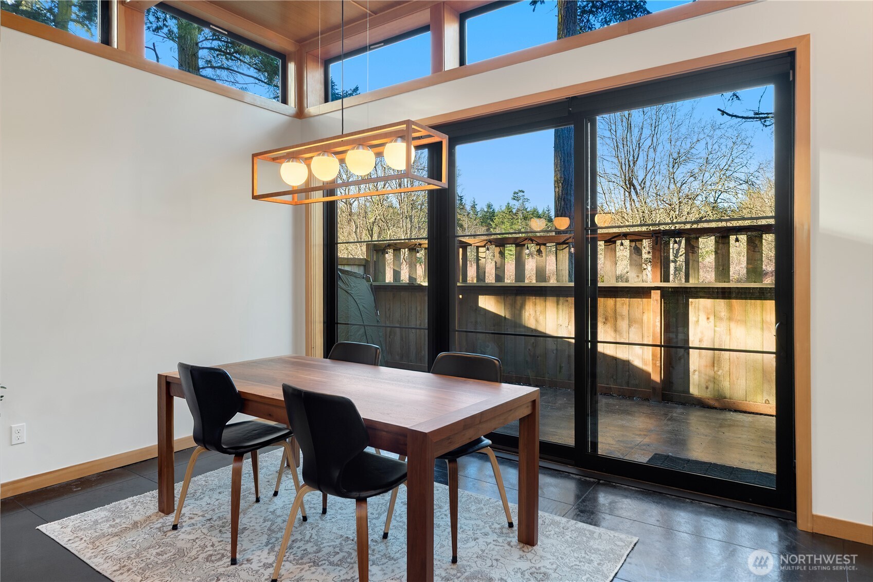 2475 15th Street Port Townsend, WA 98368 - Photo 7 of 27 a view of a dining room with furniture window and wooden floor
