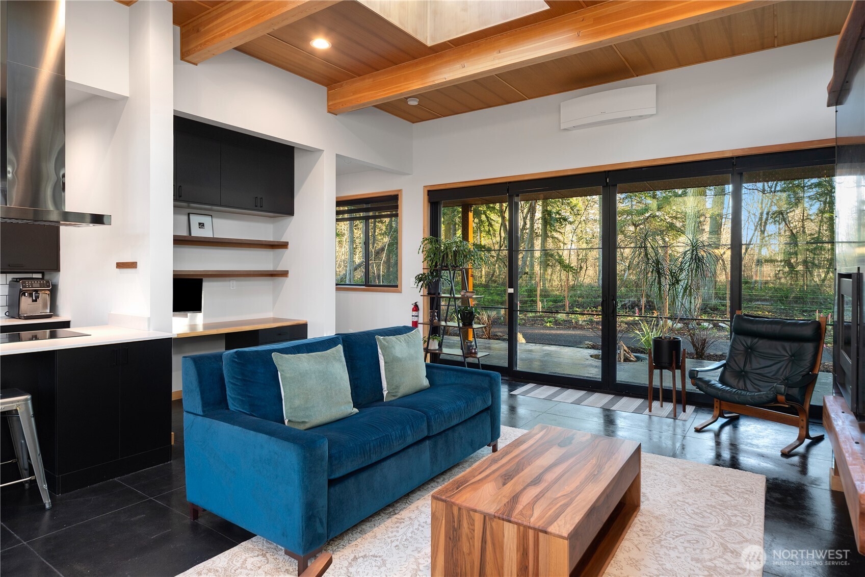2475 15th Street Port Townsend, WA 98368 - Photo 8 of 27 a living room with furniture tv and a large window