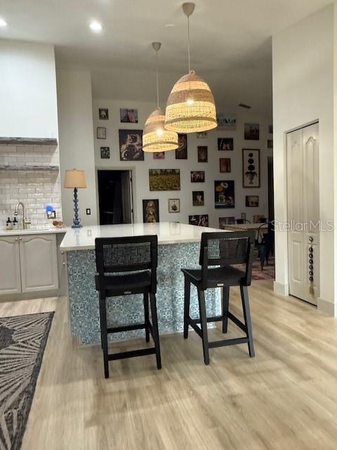 7 Federal Lane Palm Coast, FL 32137 - Photo 14 of 59 a view of a kitchen with a table and chairs