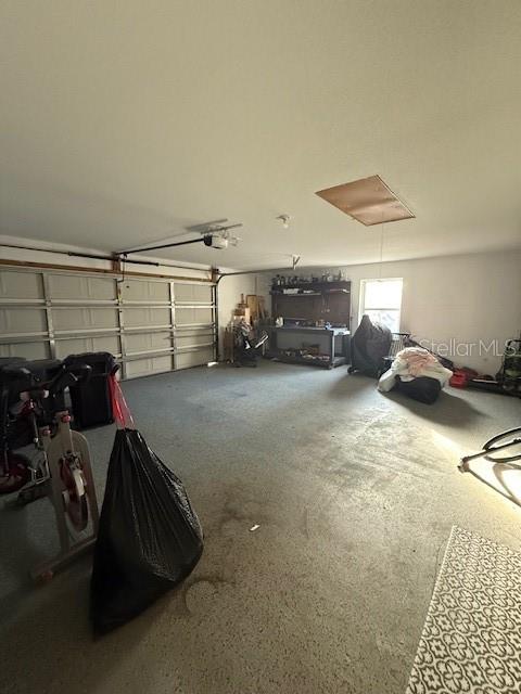 7 Federal Lane Palm Coast, FL 32137 - Photo 21 of 59 a view of a garage with parked cars