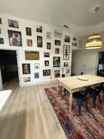 a living room with furniture and a fountain