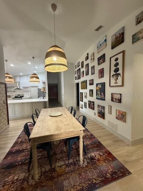 7 Federal Lane Palm Coast, FL 32137 - Photo 26 of 59 a view of a dining room and livingroom view