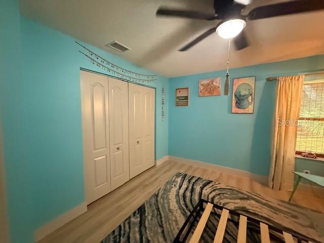 7 Federal Lane Palm Coast, FL 32137 - Photo 32 of 59 a bedroom with a bed and a window