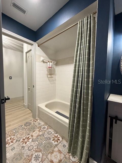 7 Federal Lane Palm Coast, FL 32137 - Photo 41 of 59 a bathroom with a bathtub and a shower