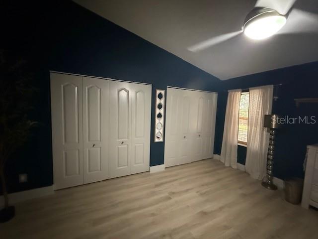7 Federal Lane Palm Coast, FL 32137 - Photo 45 of 59 a view of an empty room with window and wooden floor