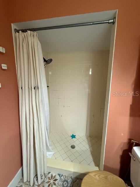 7 Federal Lane Palm Coast, FL 32137 - Photo 48 of 59 a bathroom with a shower and a toilet