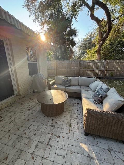 7 Federal Lane Palm Coast, FL 32137 - Photo 57 of 59 a living room with furniture and a fountain