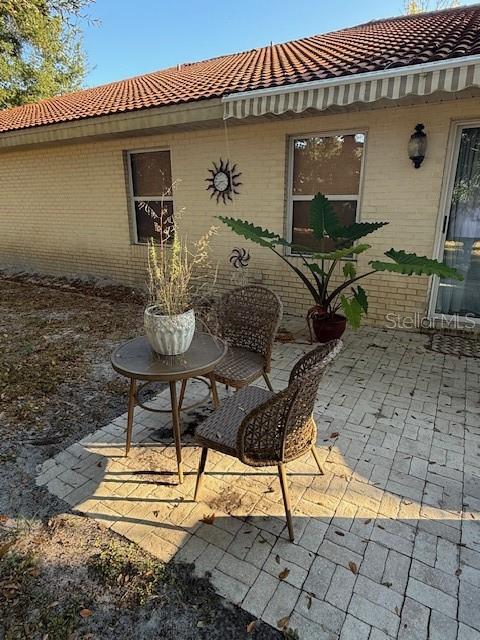 7 Federal Lane Palm Coast, FL 32137 - Photo 58 of 59 a front view of a house with garden