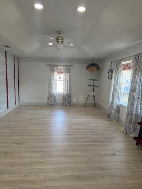 7 Federal Lane Palm Coast, FL 32137 - Photo 6 of 59 a view of empty room with wooden floor and fan