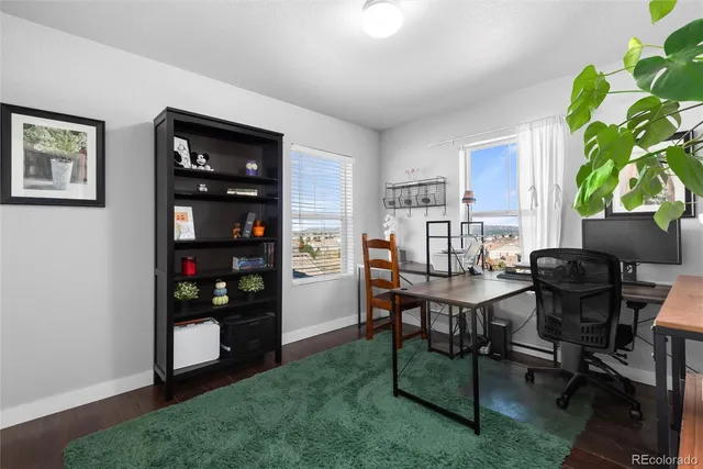 a view of a workspace with furniture