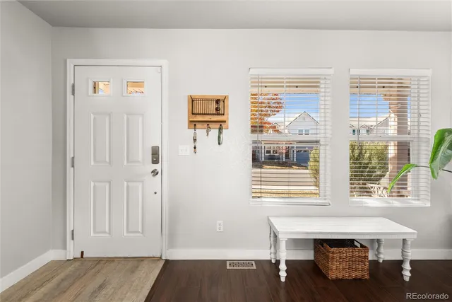 a view of livingroom with furniture and windows