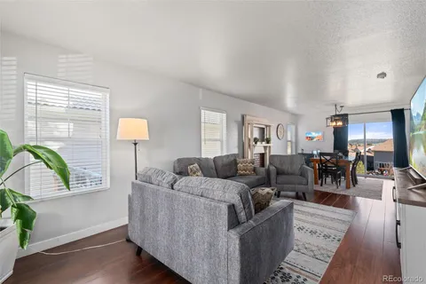 a view of a patio with a chairs and a table