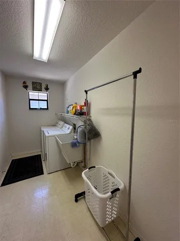 a storage room with washer and dryer