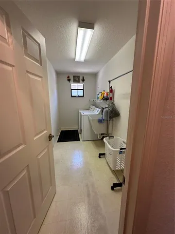 a view of a room with rack on the wall