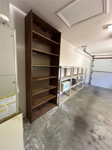 a view of a livingroom with furniture and window