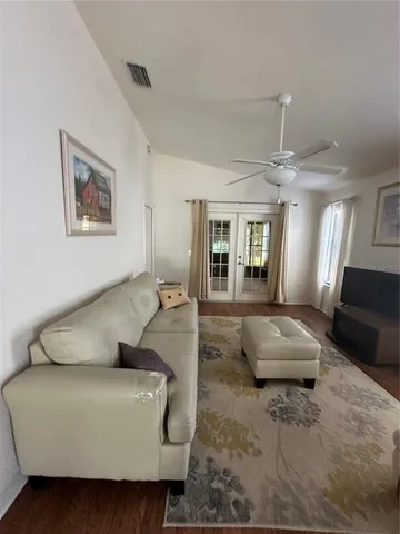 a living room with furniture and a couch