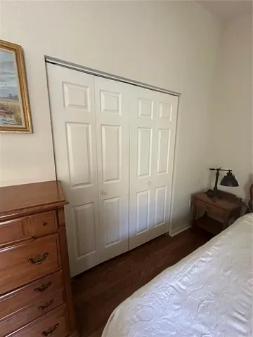 a bathroom with a toilet and shower