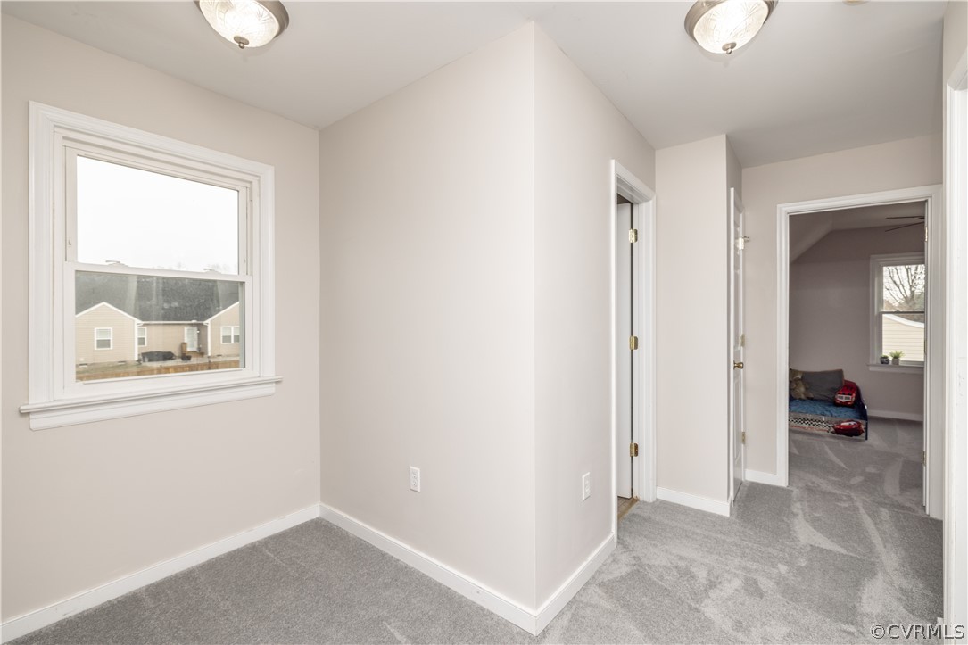 7737 Drexelbrook Road Chesterfield, VA 23832 - Photo 24 of 39 a view of an empty room with wooden floor and a window