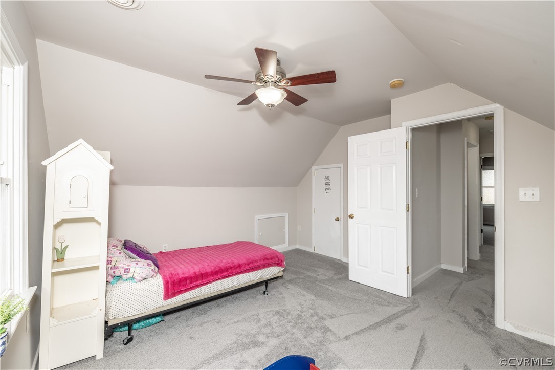 7737 Drexelbrook Road Chesterfield, VA 23832 - Photo 26 of 39 a bedroom with a bed and a table with a potted plant