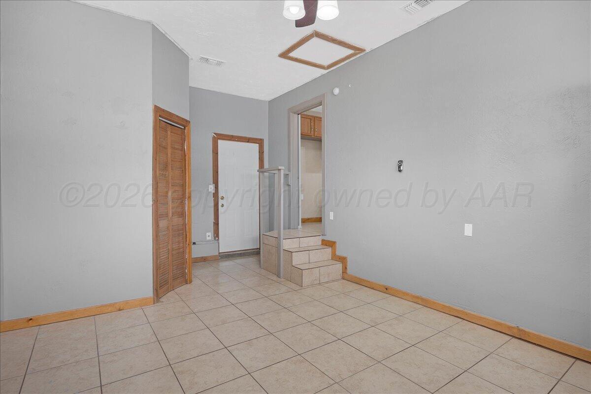 1504 Birch Street Amarillo, TX 79107 - Photo 16 of 19 wooden floor in an empty room
