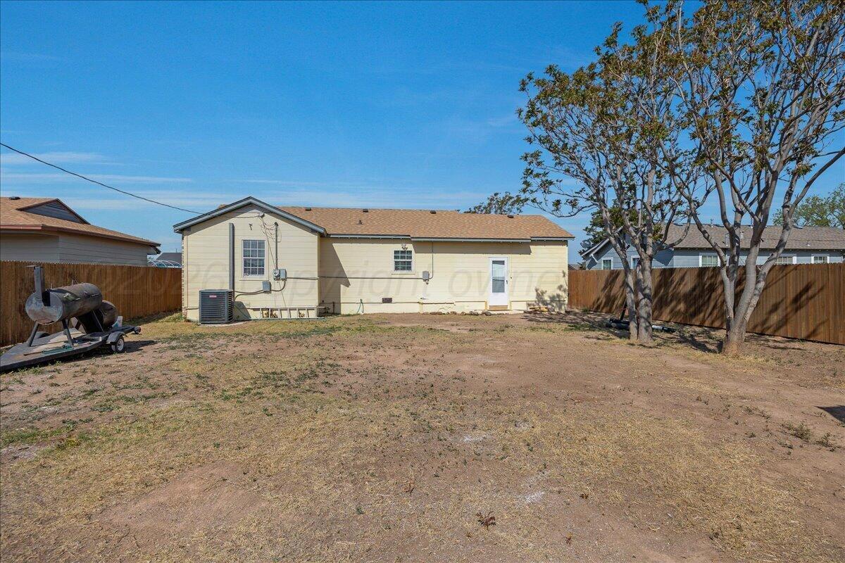 1504 Birch Street Amarillo, TX 79107 - Photo 18 of 19 a view of house with backyard and parking