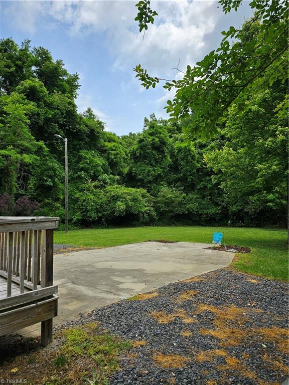141 Roberts Road Eden, NC 27288 - Photo 15 of 15 View of backyard with concrete pad for parking etc.