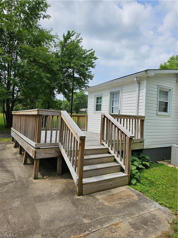 141 Roberts Road Eden, NC 27288 - Photo 3 of 15 Back view with full view of deck