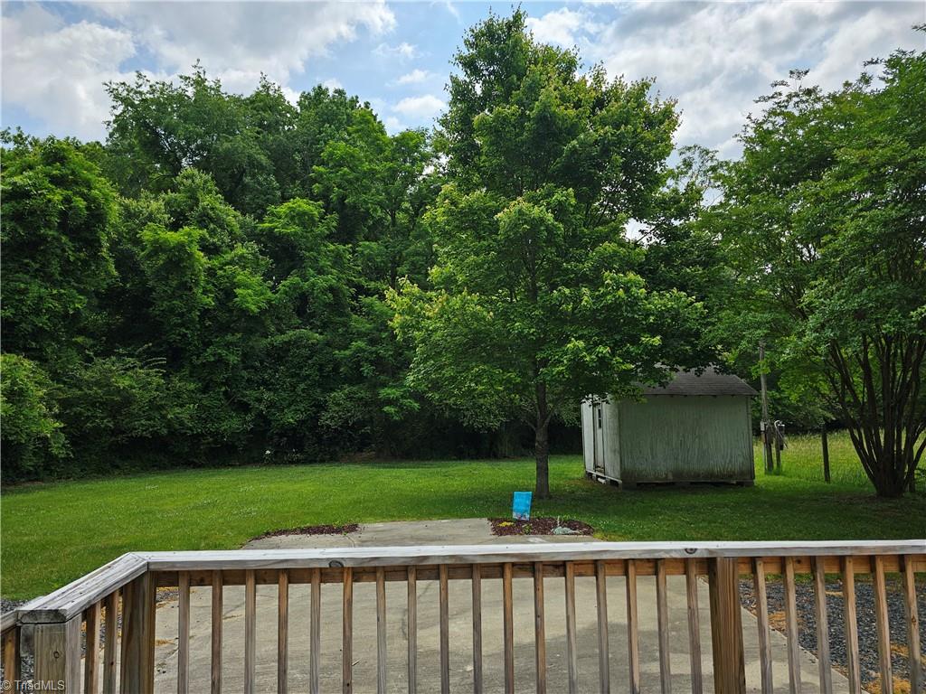 141 Roberts Road Eden, NC 27288 - Photo 4 of 15 View of back yard and building