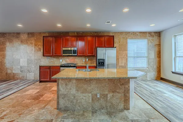 a view of entryway and hall with a dining table