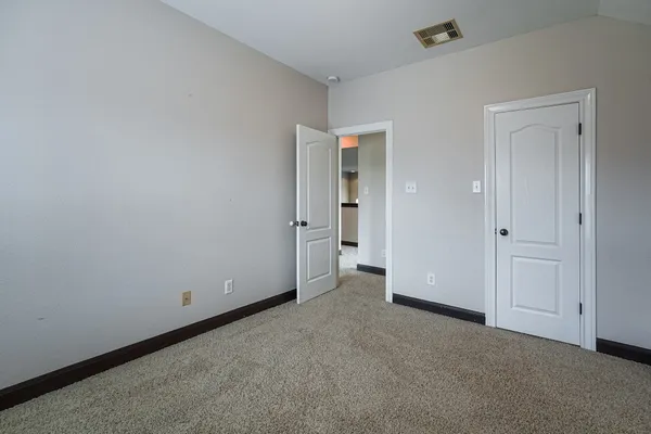 a view of a room with rack on the wall