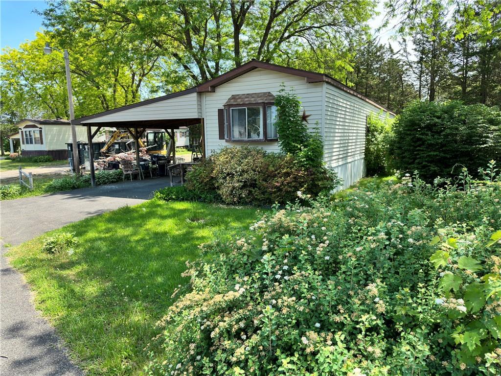 146 Stone Mill Road, Unit 22 Hudson, NY 12534 - Photo 1 of 1 View of front of property with a front lawn