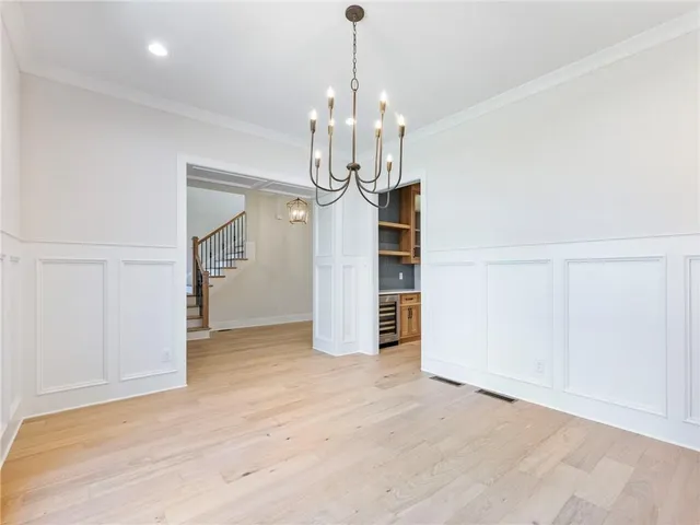 a view of kitchen with furniture and large window