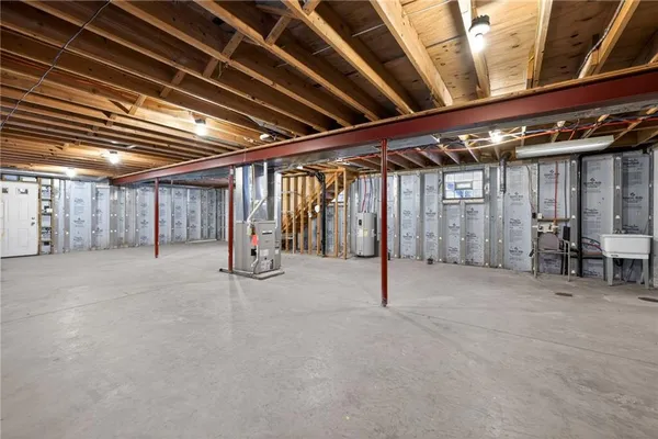 a view of an empty room with two washing machine