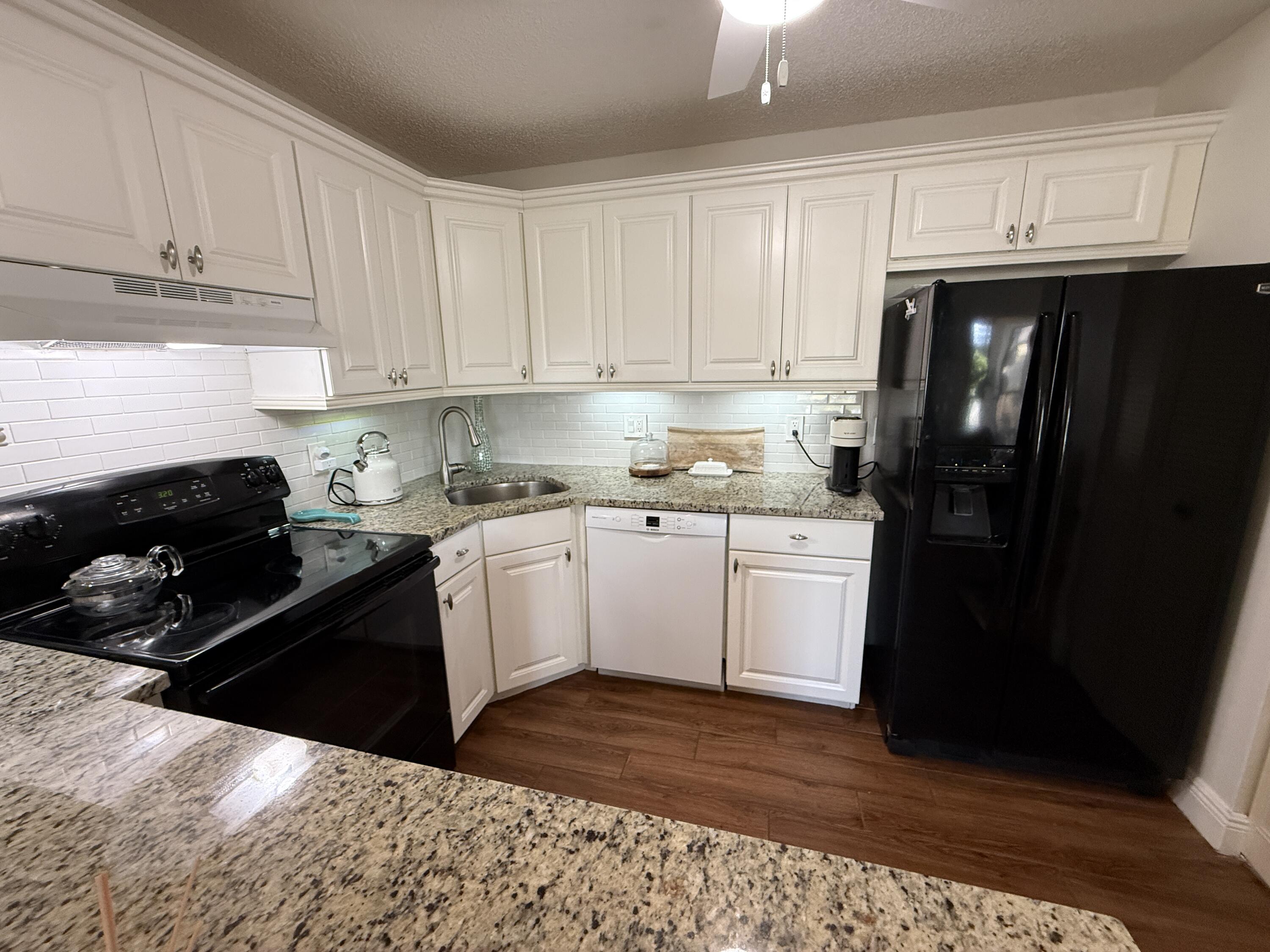 338 Pine Ridge Circle, Unit B2 Greenacres, FL 33463 - Photo 21 of 55 Kitchen