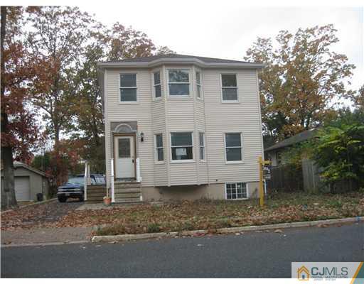 877 Englishtown Road Old Bridge, NJ 08857 - Photo 3 of 8 a view of a house with a yard