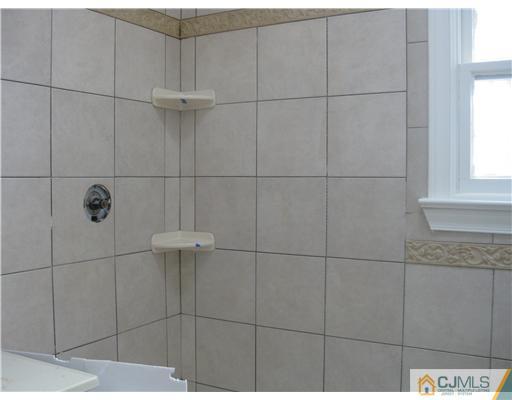 877 Englishtown Road Old Bridge, NJ 08857 - Photo 7 of 8 a bathroom with a shower
