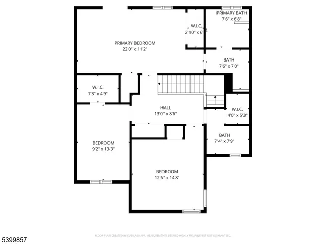 a picture of a building with a white wall and sign