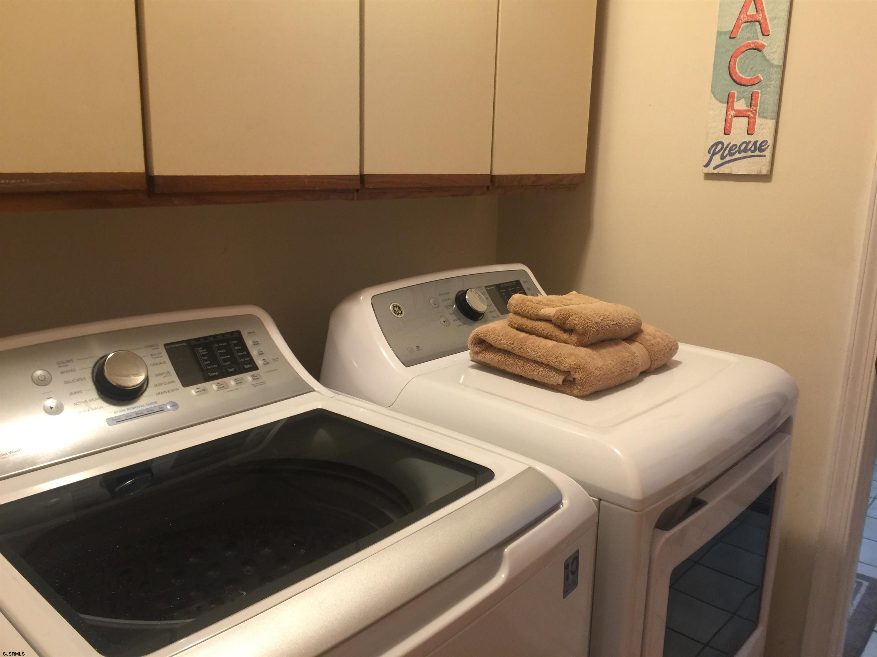 4013 West Brigantine Avenue, Unit 1 Brigantine, NJ 08203 - Photo 15 of 33 a utility room with dryer and washer