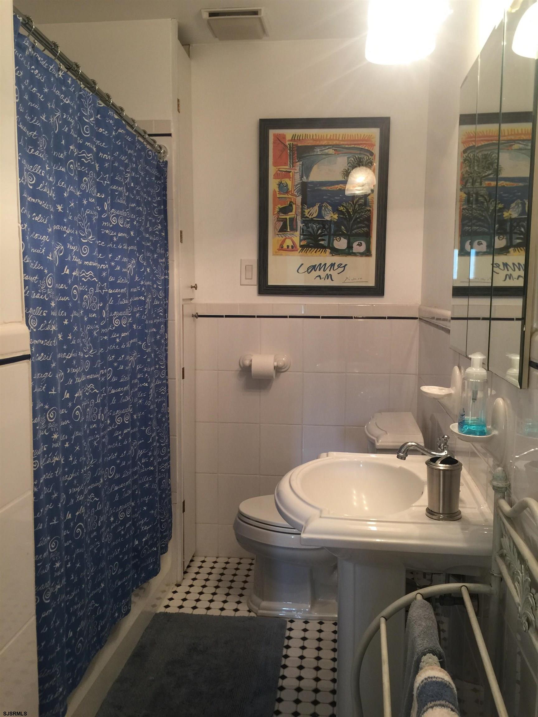 4013 West Brigantine Avenue, Unit 1 Brigantine, NJ 08203 - Photo 20 of 33 a bathroom with a sink and a toilet