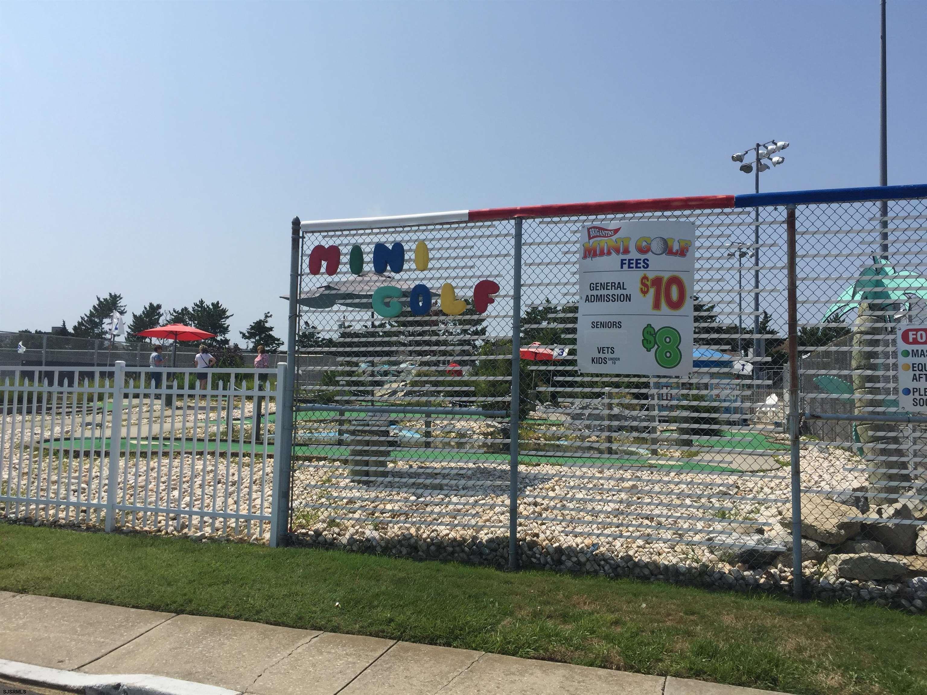 4013 West Brigantine Avenue, Unit 1 Brigantine, NJ 08203 - Photo 29 of 33 a front view of a house with a yard
